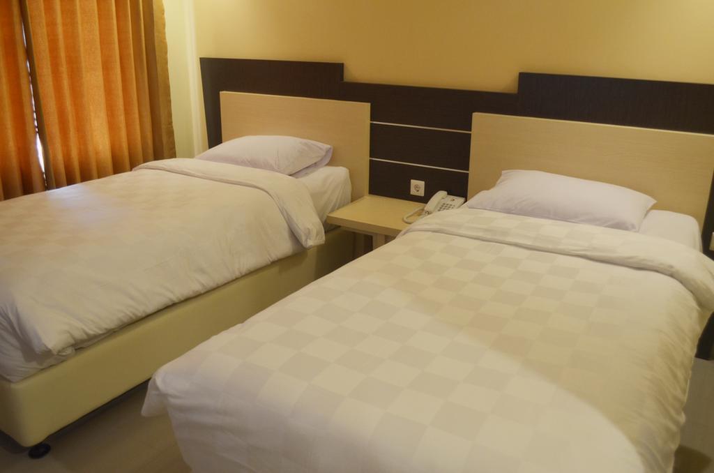 M Hotel Mataram Szoba fotó